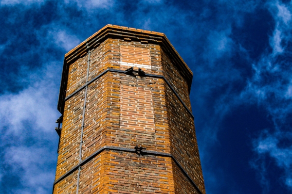 An old chimney made with red bricks beside the Dodder River, Dublin